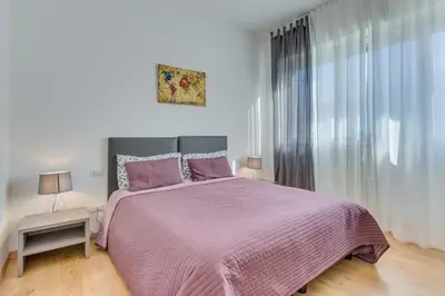 Letto o letti in una camera di Rooms Vidar