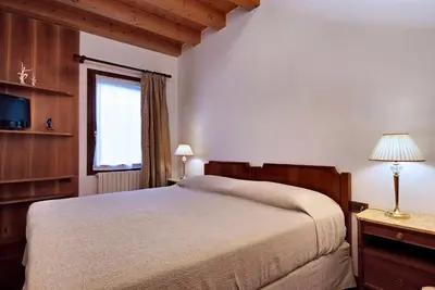 Letto o letti in una camera di Villa Dacri