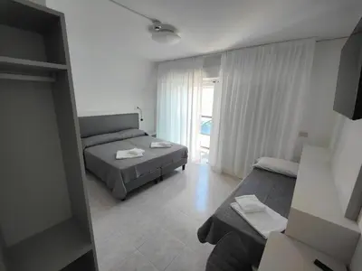 Letto o letti in una camera di Hotel DOLCEVITA Park & Beach included
