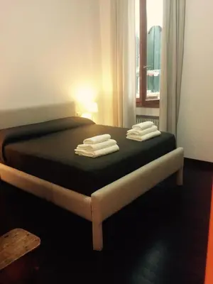 Letto o letti in una camera di Venetian House