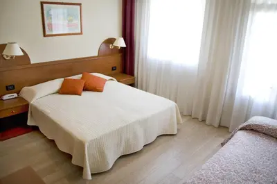 Letto o letti in una camera di Hotel Sole