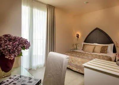 Letto o letti in una camera di Baia del Mar Beach Boutique Hotel