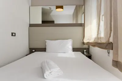 Letto o letti in una camera di Hotel Delle Mimose