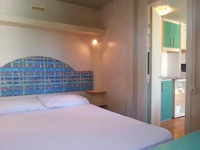 Letto o letti in una camera di Villaggio Camping Europa