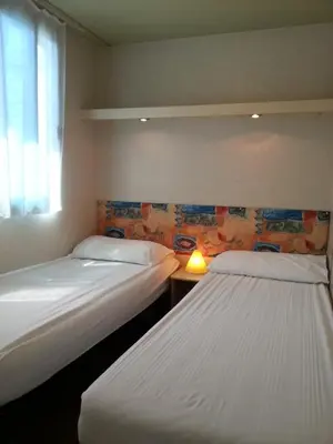 Letto o letti in una camera di Villaggio Camping Europa