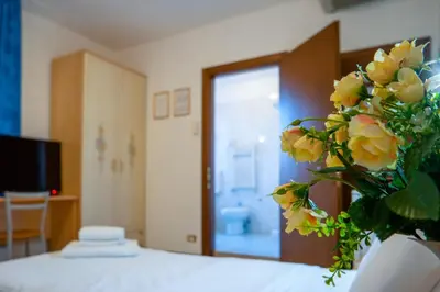 Letto o letti in una camera di Hotel New Aurora Venice