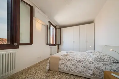 Letto o letti in una camera di VeNICe Cera Casa Margherita