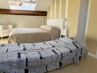 Letto o letti in una camera di Moonlight Attic