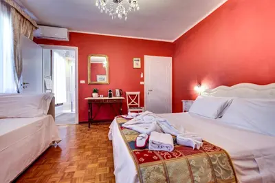 Letto o letti in una camera di Ca' Riza