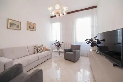 TV o dispositivi per l'intrattenimento presso Riva Excelsior Apartment