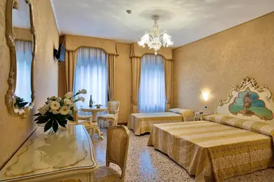 Letto o letti in una camera di Hotel Al Malcanton