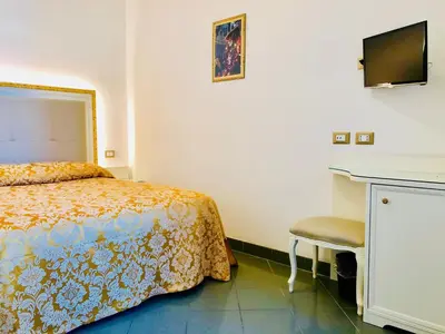 Letto o letti in una camera di Hotel Marte