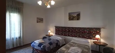 Letto o letti in una camera di Ve-nice Suite Formosa C5141