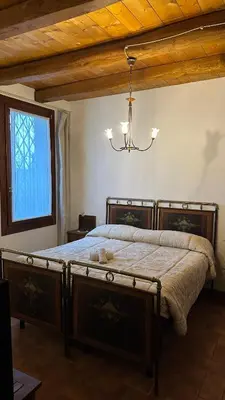 Letto o letti in una camera di Residenza Airone