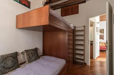 Letto o letti in una camera di 7 WINDOWS ON VENICE by LionHost