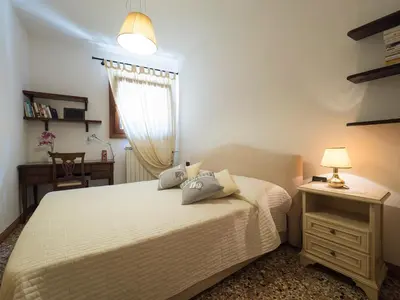 Letto o letti in una camera di Romantic Lagoon - Canal view