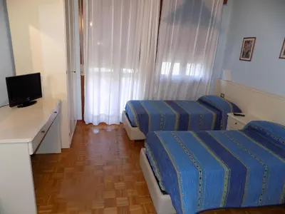 Letto o letti in una camera di Hotel Udinese da Aldo