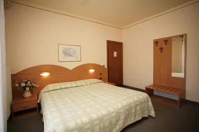 Letto o letti in una camera di Hotel Ezzelino