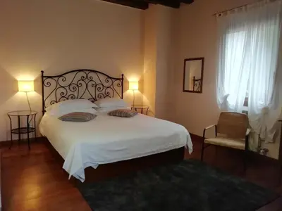 Letto o letti in una camera di Locanda degli Ulivi