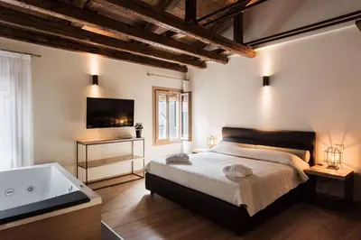 Letto o letti in una camera di B&B Casin dei Nobili