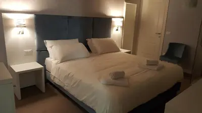 Letto o letti in una camera di Maison d'Elite Guest House