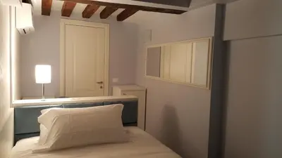 Letto o letti in una camera di Maison d'Elite Guest House
