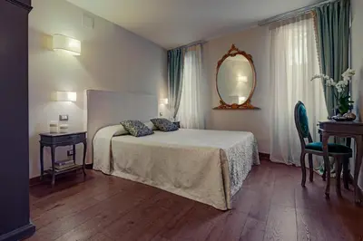 Letto o letti in una camera di Locanda Fiorita