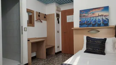 Letto o letti in una camera di BlueColors Hotel