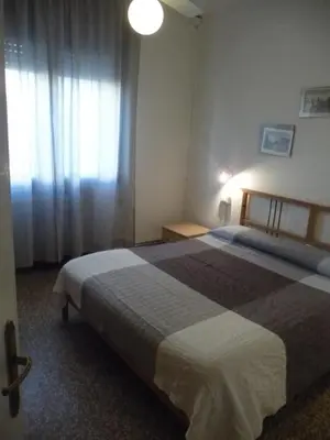 Letto o letti in una camera di Appartamento Franca