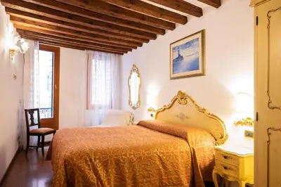 Letto o letti in una camera di Ca' Pinelli