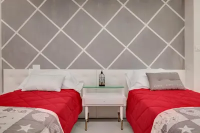 Letto o letti in una camera di Bacchus Venice Residence by Wonderful Italy