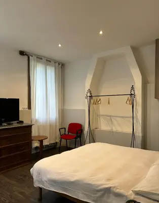 Letto o letti in una camera di Casa Martini