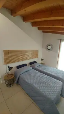 Letto o letti in una camera di CASA GIORGIA - NEL CUORE DI VICENZA