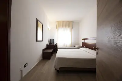 Letto o letti in una camera di Hotel Vienna