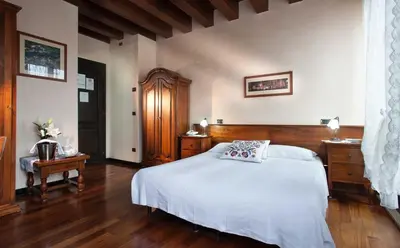 Letto o letti in una camera di Hotel Al Castello