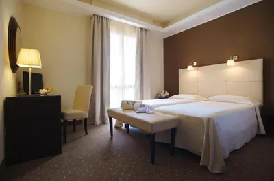 Letto o letti in una camera di Hotel Terme Olympia