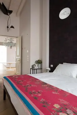 Letto o letti in una camera di Ai Bastioni Boutique Hotel
