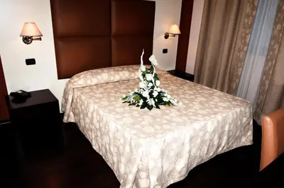 Letto o letti in una camera di Hotel Ristorante Giada