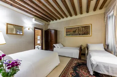 Letto o letti in una camera di Ca' Del Nobile