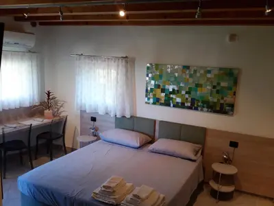 Letto o letti in una camera di Salvia e Timo Rooms
