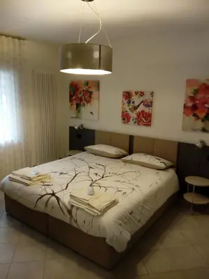 Letto o letti in una camera di Salvia e Timo Rooms
