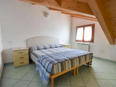 Letto o letti in una camera di Apartment Solmare-36 by Interhome