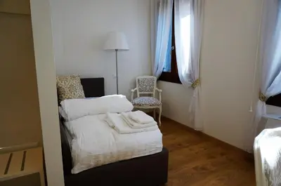 Letto o letti in una camera di B&B HORTUS