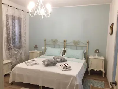 Letto o letti in una camera di Dimora Naviglio
