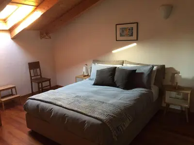 Letto o letti in una camera di Casa Lunia