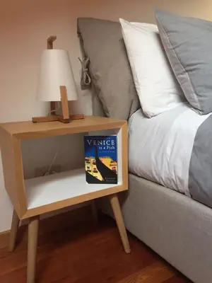 Letto o letti in una camera di Casa Lunia