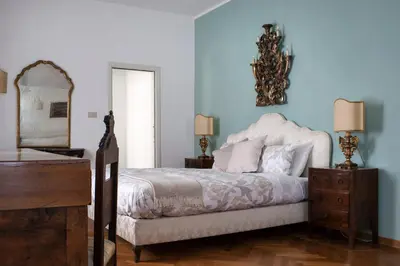 Letto o letti in una camera di Casa Lunia Guesthouse