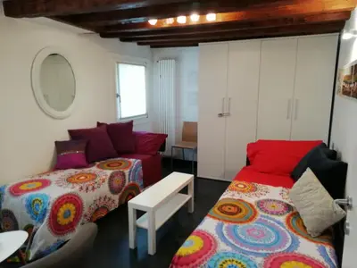 Letto o letti in una camera di Cà Mercante di Spezie