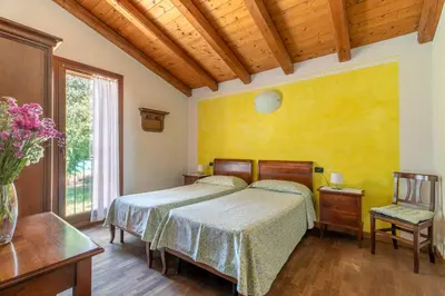 Letto o letti in una camera di Agriturismo Porcaloca