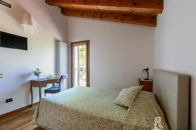 Letto o letti in una camera di Agriturismo Porcaloca